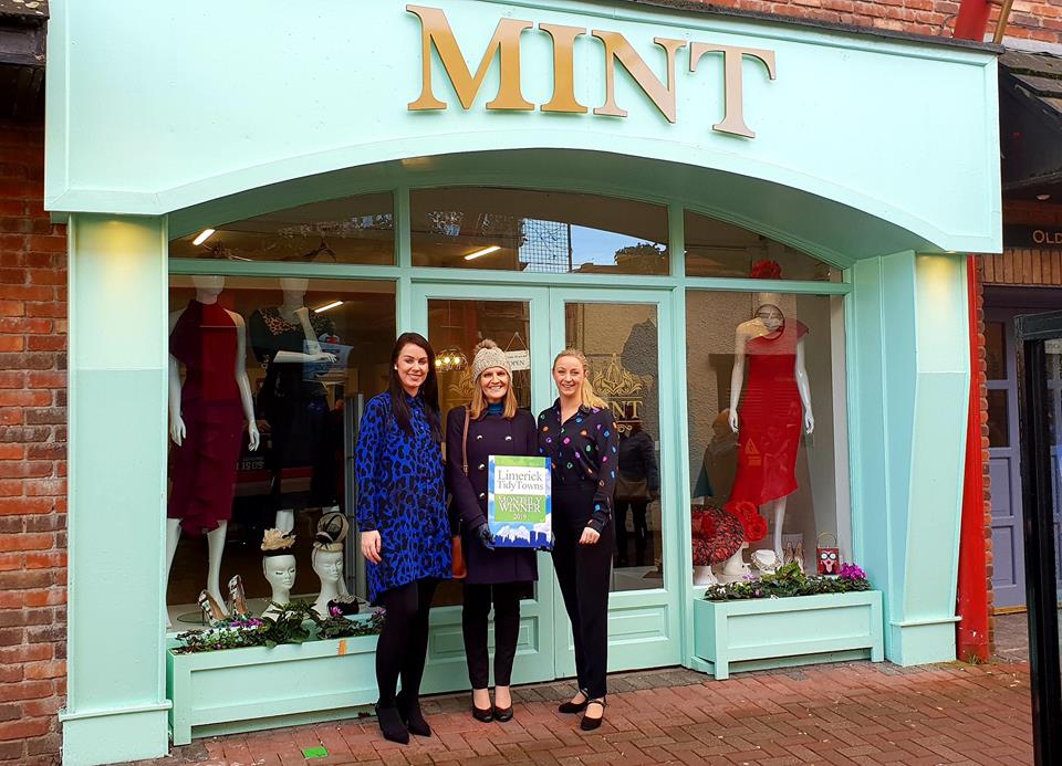 mint boutique recieving award